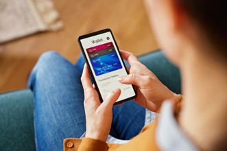 Looking down at cell phone