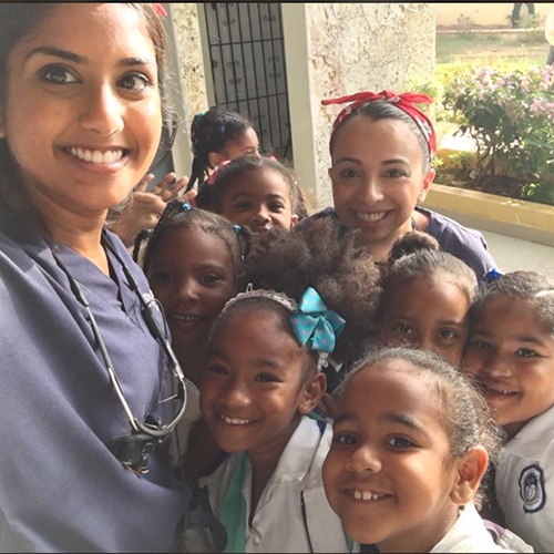 Doctor Shah and a group of children on a mission trip